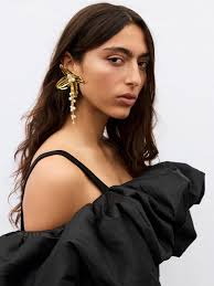 As Seen On. Nadia Phillips wears the Otta Bustier & Aura Wide Leg Jeans.  @nadiaphillips