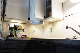 Tie an iron nail or similar object to a fish tape. Diy Kitchen Lighting Upgrade Led Under Cabinet Lights Above The Sink Light