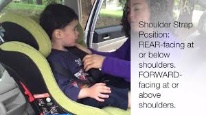 Place harness straps at or above shoulder. How To Buckle A Kid In A Car Seat Youtube