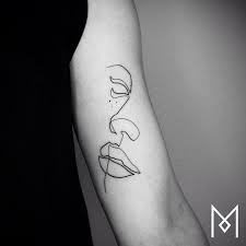Tato permanen bergambar wajah basuki tjahaja purnama atau ahok itu akan membekas di tangan penyanyi dan bintang youtube kontroversial. One Line Tattoo Mo Ganji Line Drawing Tattoos Incredible Tattoos