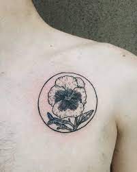 Pansy flower tattoo width different colors symbolize the three milestones of human life. Pansy Tattoo By Finley Jordan Tattoogrid Net