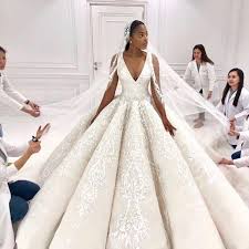 This Sleeveless Bridal Gown Has A V Neck The Large Ball Gown Style Skirt Is Flattering Get Custom W Wedding Dresses Ball Gown Wedding Dress Bridal Dresses