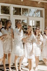 Bride With Bridesmaids Getting Ready Celebration Champagne Photo Inspo Bridal Robes Getting Ready Vintage Wedding Dress Romantic Indie Wedding Dress