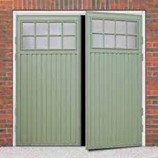 Side Hinged Garage Doors Are Incredibly Popular For Those Who Prefer Pedestrian Access To Their Garag Side Hinged Garage Doors Garage Doors Unique Garage Doors