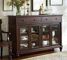 Find wood buffet tables in various finishes and add functional style to the dining room. Buffets Sideboards Pottery Barn Pottery Barn Dining Room Dining Room Design Buffet Decor