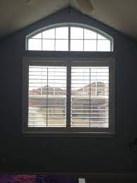 Also known as plantation shutters, these custom window coverings are like furniture for your windows. Odd Shaped Window Covering Idea