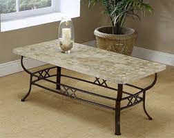 This is a very interesting design with forged iron and large rivets all around the top frame. Wrought Iron Coffee Table Interior Design Ideas Coffee Table Furniture Iron Coffee Table Stone Coffee Table