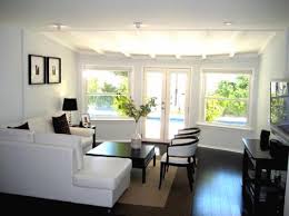 Black And White Leather Sectional Kasia Our Contemporary Family Room White Leather Sectional Sofa Black Coffee Table White Living Room Leather Contemporary Family Rooms Family Room