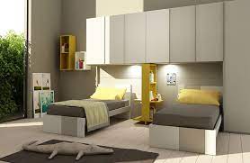 Check spelling or type a new query. Kid Bedroom With Bridge Wardrobe For Two Beds Idfdesign