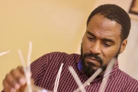 WAXING POETIC. Eric Johnson's business venture passes…