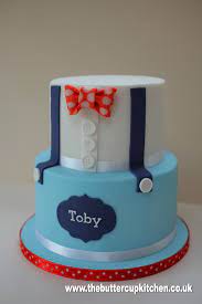I don't like to brag, but i am pretty darn proud. Two Tier Boys Cake With Braces And Bow Tie Suitable For A Birthday Or Baby Cake Baby Shower Cakes Baby Boy Cakes