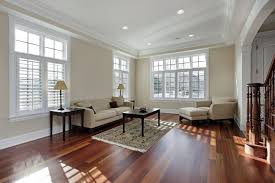 This living room is small but the cool toned light hardwood floors and matching furniture make it look spacious. 24 Hardwood Flooring Ideas Living Room Paint Living Room Flooring Living Room Colors