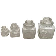 Apothecary jar works with the following tops: Vintage Dakota Square Drugstore Apothecary Ground Glass Jars With Lids For Sale At 1stdibs
