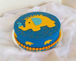 Is your toddler turning two years old soon and you are planning a great party? Simple Elephant Themed 2 Year Old Birthday Cake 2 Year Old Birthday Cake Elephant Birthday Cakes Birthday Cake Kids