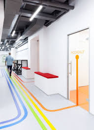 Colourful Lines Inspired By The London Underground Lead You To Classrooms At This Language School Hospital Interior Kindergarten Design Hospital Design