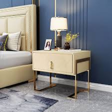 | indian designer handmade stainless steel base with green leather stool. Modern Stylish Nightstand Upholstered Bedside Table With Drawer Gold Metal Base Nightstand In Champagne Nightstand Decor Bedroom Night Stands Modern Nightstand