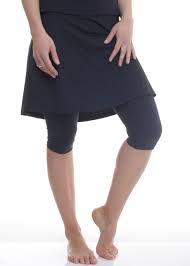 Flowy Swim And And Sport Skirt Is Above The Knee Length With Attached Leggings That Cover The Knees The Skirt Sports Skirts Womens Swim Bottoms Swim Leggings