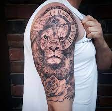 15 Lion And Clock Tattoo Designs Cool Lion Clock Tattoos Mens Shoulder Tattoo Clock Tattoo Sleeve Lion Shoulder Tattoo