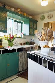 She utilized the space above the cabinets for simple open. 18 Ideas For Decorating Above Kitchen Cabinets Design For Top Of Kitchen Cabinets