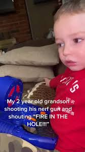 Kid Shooting Nerf