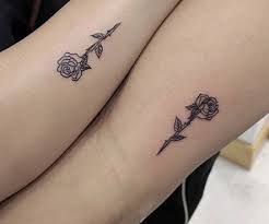 A tree symbolizes strength for protection and forgiveness along with growth. Small Rose Tattoo Cousin Tattoos Small Rose Tattoo Tattoos For Daughters