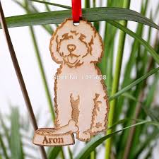 For only $10 + shipping you can have an tree ornament of your beloved four legged child. Goldendoodle Dog Christmas Tree Ornament Xmas Gift Wrapped Personalized Pet Ornament Customized With Dogs Name Nayancorporation Com