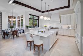 Helpful amenities, like deep drawer storage and open cabinetry for cookbooks, keeps the cook organized, while a prep sink in the island allows others the chance to pitch. 75 Beautiful Tropical Kitchen Pictures Ideas June 2021 Houzz