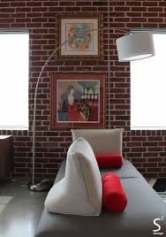 Black And White Bricks Design Loft With Exposed Brick And Modern Sofa Houston Interior Designers Residential Interior Design Red Interior Design