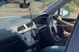 Photography of a modern crossover made in japan in autosalon. 2021 Volkswagen Tiguan Interior Exterior Revealed