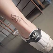 Achilles Tattoo Of A Lily Of The Valley Tattoos Ankle Tattoo Designs Tattoos For Women