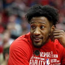 Download Robert Covington Wears Red After Game Wallpaper