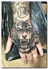 Best 25 Lion Hand Tattoo Ideas On Pinterest Hand Tattoos Rose Hot Tattoo Lion Hand Tattoo Tiger Hand Tattoo Hand Tattoos For Guys