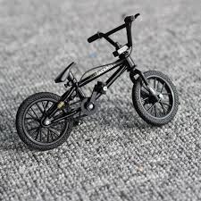 Nous ne sommes pas une de ces nouvelles entreprises au discount agressif, mais soyez sûrs que nos tarifs resteront à l'égal de notre nom : 1 50 Noir Doigt Velo Jouet Flick Trix Mini Bmx Velos Velo Modele Jouets Pour Enfants Garcons Vtt Cadeau Nouveaute Jeu Fsb Bike Toy Bmx Bmx Bikes
