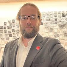 Which is a better sideboard card, Containment Priest or Grafdigger's Cage,  in Competitive Legacy Format?