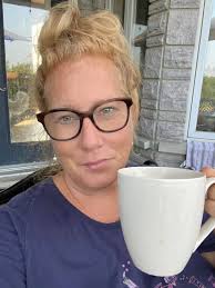 Pearl saz good morning my fwends. Here's my present I got from my fwend  last nigh. It's a talking and moving kitty. I wuvs it. My grandmas Ginger  sitting