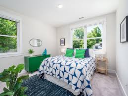 This Old North Durham Dacian delight was custom crafted by Gail Crabtree in  2017. The home boasts 4 bedrooms and an open-concept main floor. The modern  kitchen, cozy living room with fireplace