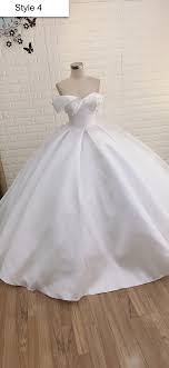 Dreamy ballgown wedding dress with duchess satin bodice and tulle skirt. Minimalist Elegant White Satin Ball Gown Wedding Dress Hanging Sleeves Or Short Sleeves Various Styles