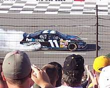 Denny hamlin held off reigning cup series champion joey logano and teammate kyle busch to win the 61st running of the daytona 500 on sunday evening. Denny Hamlin Wikipedia