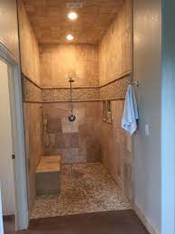 Walk In Shower No Door Travertine And Pebble Tile Shower Remodel Shower No Door Bathroom Remodel Shower