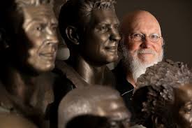 Capturing beloved faith and football heroes in bronze