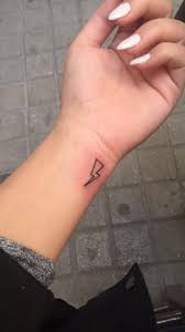 A simple bolt of lightning is a simple, yet striking look, depending on the location of the tattoo. Minimalist Harry Potter Lightning Bolt Tattoo Novocom Top