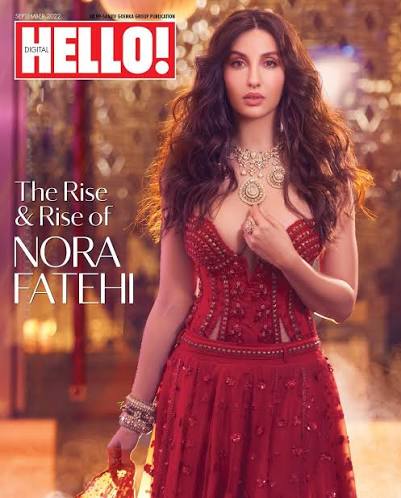 HELLODigitalCover: Presenting the global sensation, Nora Fatehi  (@norafatehi) on our September Digital Cover! . Nora looks spectacular in a  vermilion botanique lehenga with an embellished bodysuit and floral  appliqué dupatta from Shivan