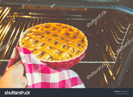 fresh baked golden apple pie red stock