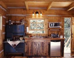 Photos Of A Tiny Log Cabin Home The Final Installment Of The Log Home Diary Small Cabin Kitchens Tiny Cabin Kitchen Small Cabin Interiors