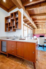 Clean kitchen cabinets with the mildest cleaner available, such as dish soap and water, to avoid damage. Absolutely Stunning Renovation Of A Mid Century Modern Home In La