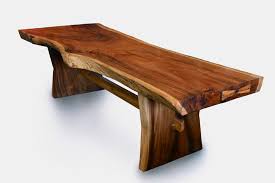 Wood slab and tree round tables. Blue Moon Furniture Authentically Sculpted Wood Furniture