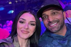 When country singer Alexis Wilkins walked onto the stage at the National  Rifle Association's annual convention in Atlanta this spring, she did so  with an unusual level of protection. Members of an