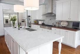white kitchen cabinets with granite