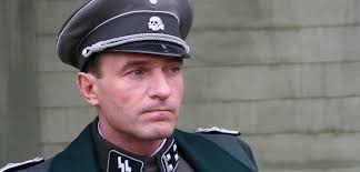 Placing the young, idealistic less played by troy garity against langatmiger, schwacher film. Review Eichmann Slant Magazine