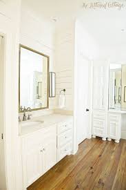 Kathy S Wood Walled Bathroom The Lettered Cottage Wood Floor Bathroom White Wood Floors White Cabinetry
